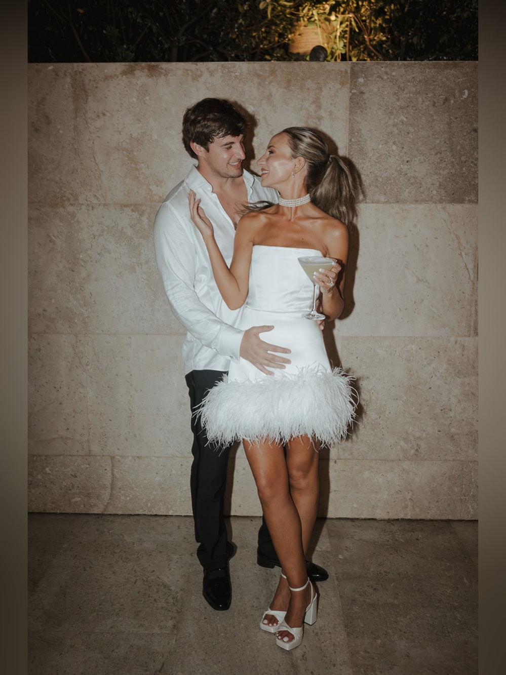 Bronx and Banco White Strapless Mini Dress with Feather Hem